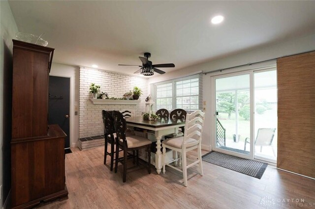403 W Rahn Rd, Dayton, OH 45429 - dining space with recessed lighting, a ceiling fan, light wood-type flooring, and brick wall