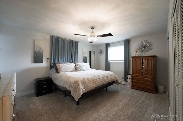 403 W Rahn Rd, Dayton, OH 45429 - carpeted bedroom featuring baseboards and a ceiling fan