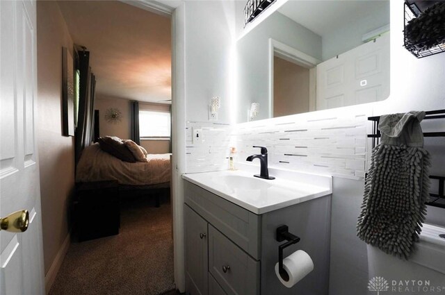 403 W Rahn Rd, Dayton, OH 45429 - bathroom featuring vanity and backsplash