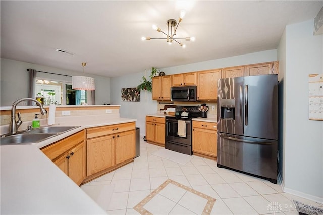 kitchen featuring light tile patterned flooring, stainless steel refrigerator with ice dispenser, black electric range, a sink, and a notable chandelier