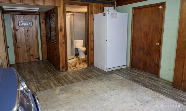 finished basement featuring wood finished floors