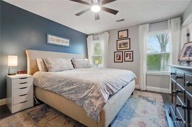 2481 Byers Ridge Dr, Miamisburg, OH 45342 - bedroom featuring ceiling fan, baseboards, visible vents, and wood finished floors