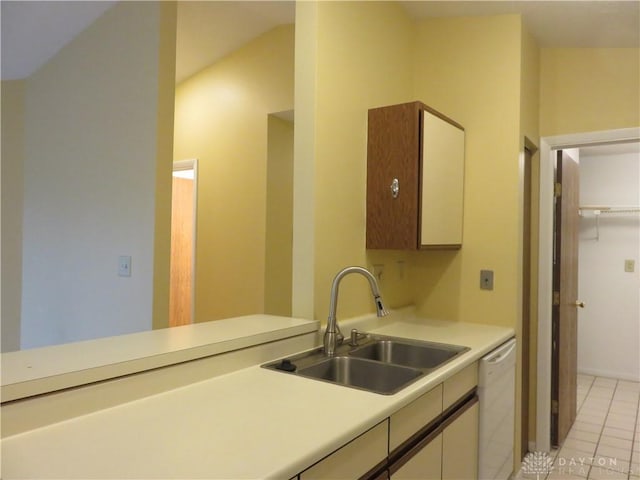 1520 Lake Pointe Way Unit 6, Centerville, OH 45459 - kitchen featuring light countertops, light tile patterned flooring, a sink, and dishwasher