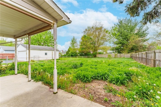 view of yard with a fenced backyard and a patio area