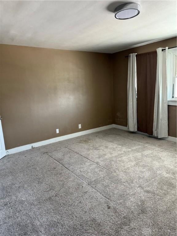 1080 Linden Ave, Dayton, OH 45410 - carpeted spare room with baseboards