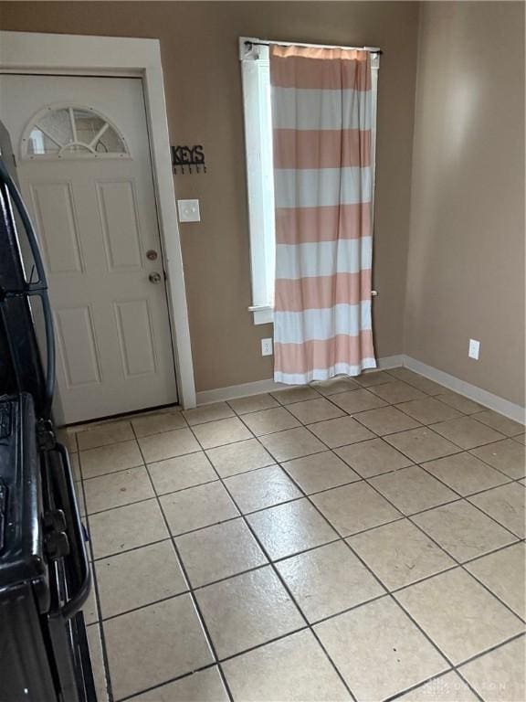 1080 Linden Ave, Dayton, OH 45410 - foyer entrance with light tile patterned flooring and baseboards