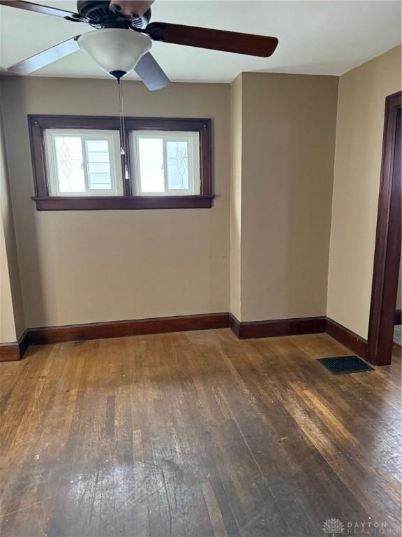 1080 Linden Ave, Dayton, OH 45410 - spare room featuring a ceiling fan, hardwood / wood-style floors, and baseboards