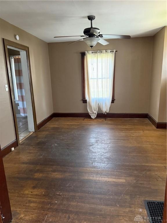 1080 Linden Ave, Dayton, OH 45410 - empty room with ceiling fan, baseboards, and hardwood / wood-style flooring