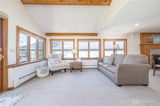 10125 Seminole Shore Dr, Huntsville, OH 43324 - living area featuring a baseboard radiator, vaulted ceiling with beams, and carpet