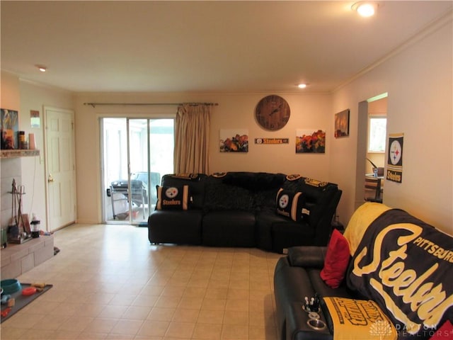 living area with recessed lighting and ornamental molding