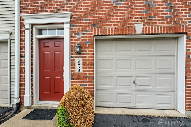 4266 Straight Arrow Rd, Beavercreek, OH 45430 - doorway to property with brick siding