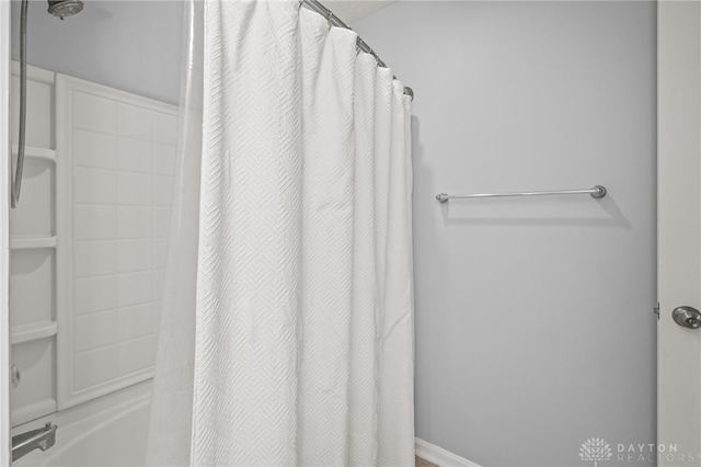 4266 Straight Arrow Rd, Beavercreek, OH 45430 - bathroom with shower / bathtub combination with curtain
