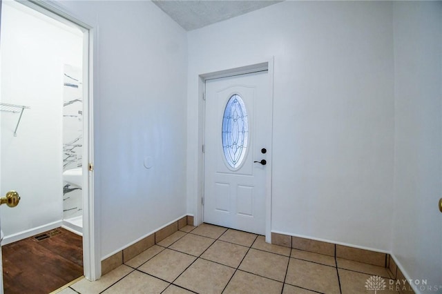 221 Linden Ave, Dayton, OH 45403 - entryway featuring light tile patterned flooring and baseboards