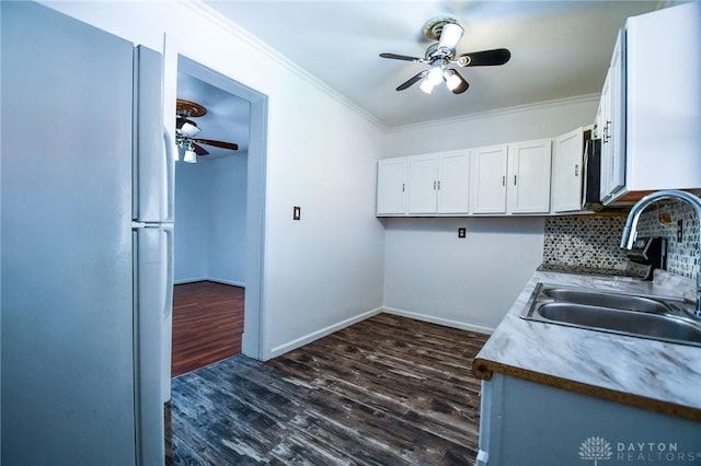 221 Linden Ave, Dayton, OH 45403 - kitchen featuring freestanding refrigerator, white cabinets, a ceiling fan, and a sink