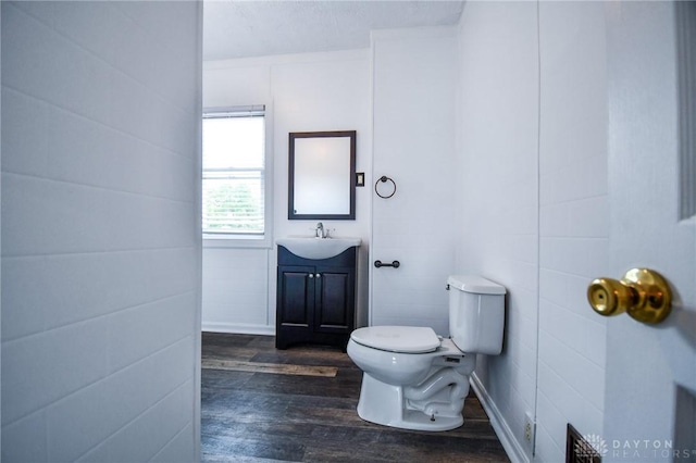 221 Linden Ave, Dayton, OH 45403 - bathroom with toilet, vanity, and wood finished floors