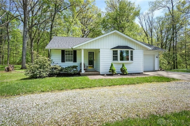 ranch-style home featuring driveway, board and batten siding, an attached garage, a shingled roof, and a porch