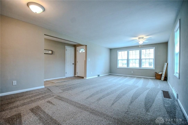 2004 N Reardon Dr, Dayton, OH 45420 - spare room featuring baseboards, carpet flooring, visible vents, and a ceiling fan