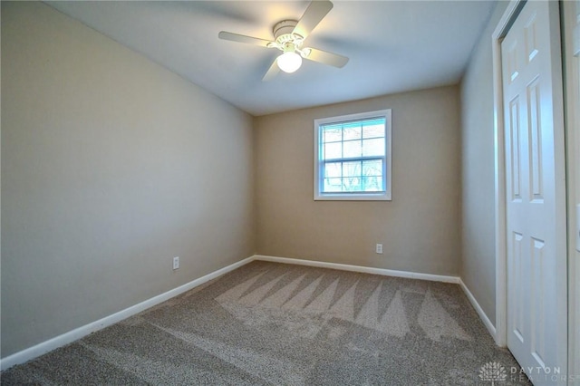 2004 N Reardon Dr, Dayton, OH 45420 - unfurnished bedroom featuring ceiling fan, carpet floors, and baseboards