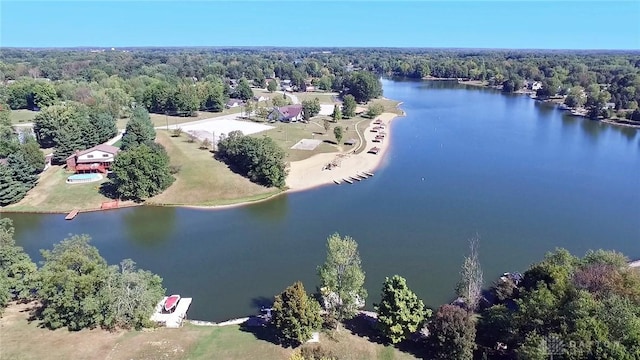 bird's eye view with a wooded view and a water view