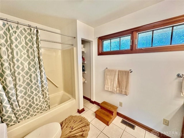 full bathroom featuring a healthy amount of sunlight, tile patterned floors, and visible vents