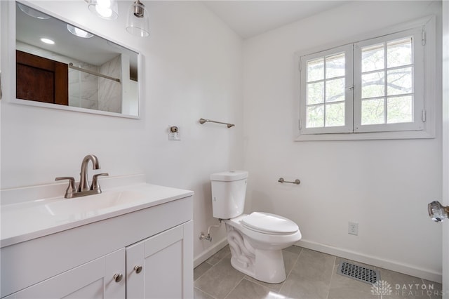 825 Far Hills Ave, Oakwood, OH 45419 - full bathroom featuring baseboards, toilet, vanity, a shower, and tile patterned flooring
