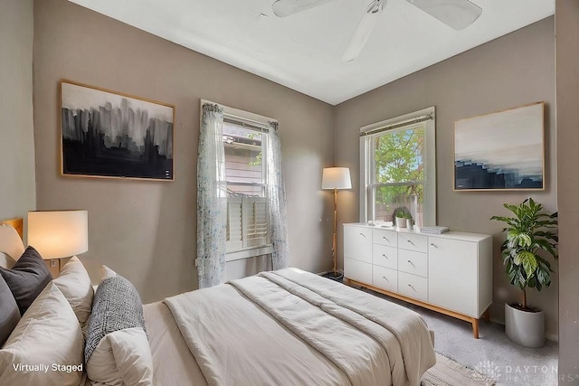 bedroom featuring light carpet