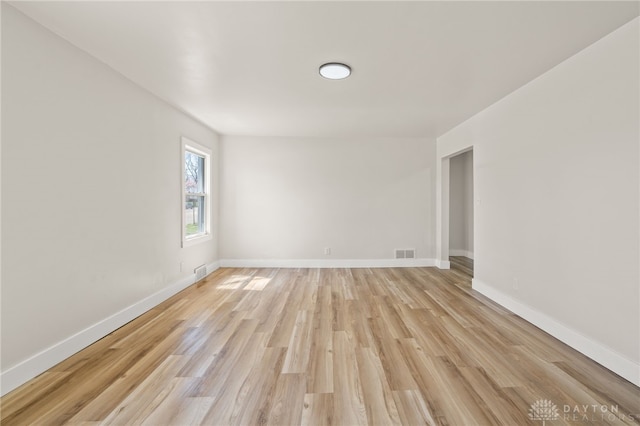 709 E Dorothy Ln, Dayton, OH 45419 - spare room featuring light wood-style floors, visible vents, and baseboards