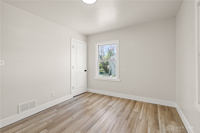 709 E Dorothy Ln, Dayton, OH 45419 - spare room featuring baseboards, light wood-style floors, and visible vents