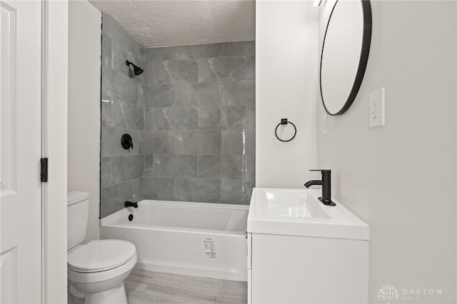 709 E Dorothy Ln, Dayton, OH 45419 - full bathroom with shower / bathing tub combination, vanity, toilet, and a textured ceiling