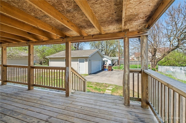 709 E Dorothy Ln, Dayton, OH 45419 - deck featuring an outdoor structure and a detached garage