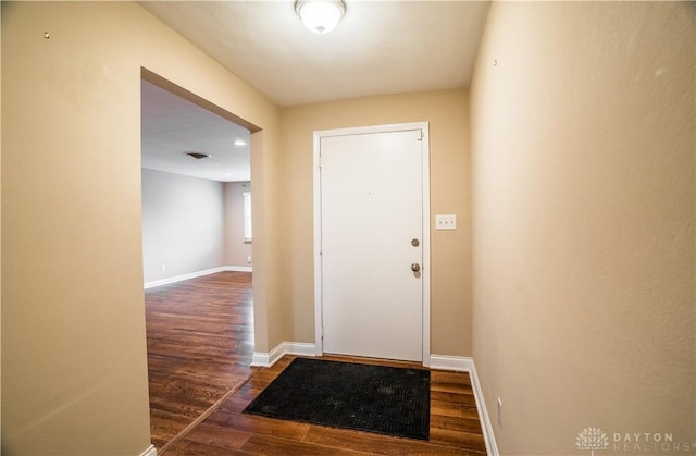 5149 Marshall Rd, Washington Twp, OH 45429 - doorway to outside featuring wood finished floors and baseboards
