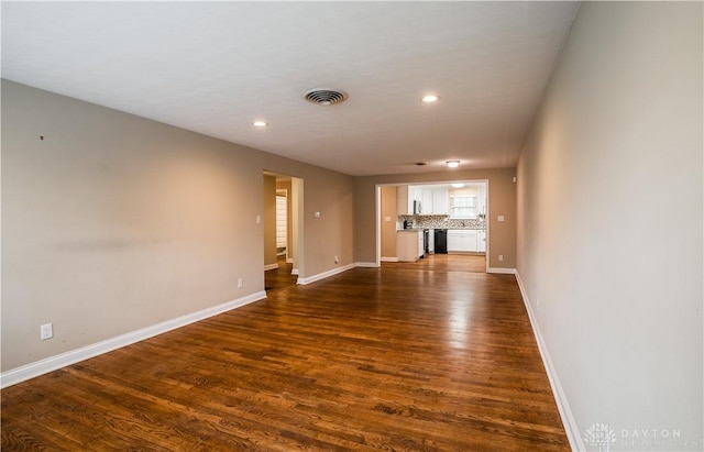 5149 Marshall Rd, Washington Twp, OH 45429 - unfurnished living room featuring dark wood-style floors, recessed lighting, and baseboards