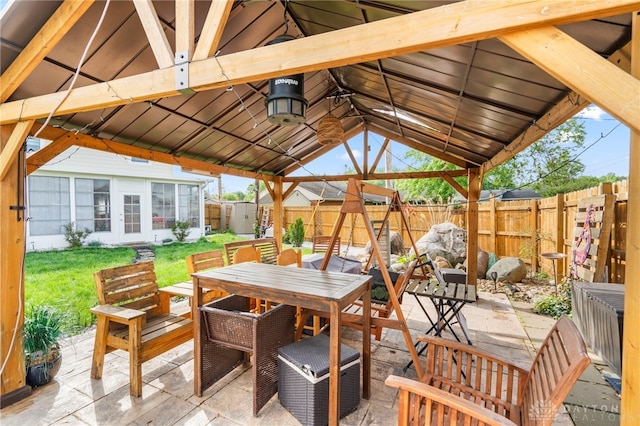 784 Marshall Dr, Xenia, OH 45385 - view of patio featuring outdoor dining area, a sunroom, and a gazebo