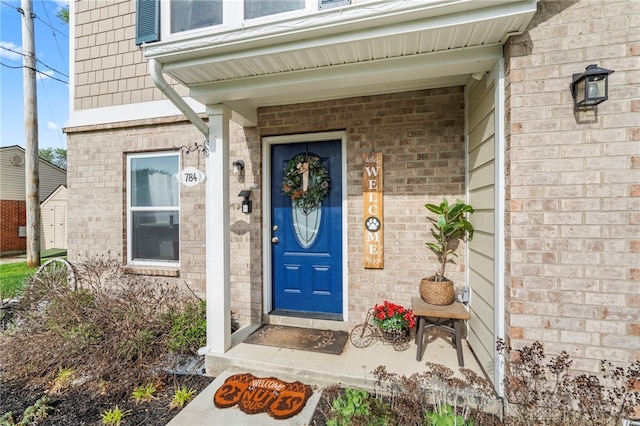 784 Marshall Dr, Xenia, OH 45385 - doorway to property featuring brick siding