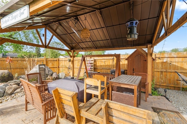 784 Marshall Dr, Xenia, OH 45385 - fenced backyard with a gazebo, outdoor dining area, and a patio