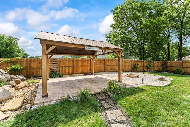 784 Marshall Dr, Xenia, OH 45385 - fenced backyard featuring a gazebo and a patio area