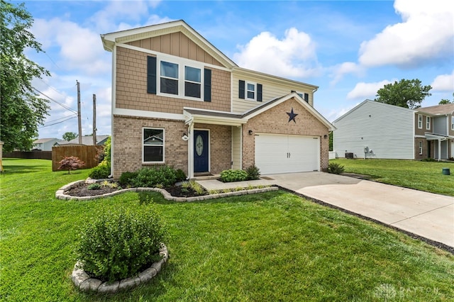 784 Marshall Dr, Xenia, OH 45385 - view of front of house featuring concrete driveway, brick siding, and a garage