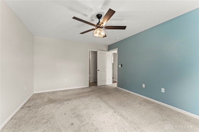 784 Marshall Dr, Xenia, OH 45385 - unfurnished bedroom featuring carpet flooring and ceiling fan