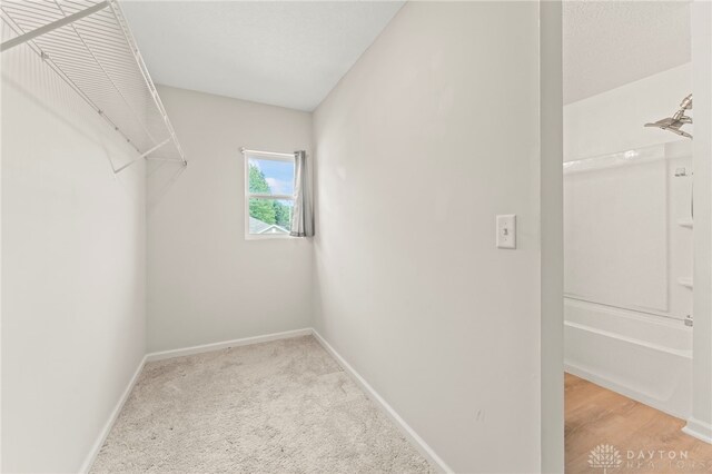 784 Marshall Dr, Xenia, OH 45385 - walk in closet featuring light colored carpet