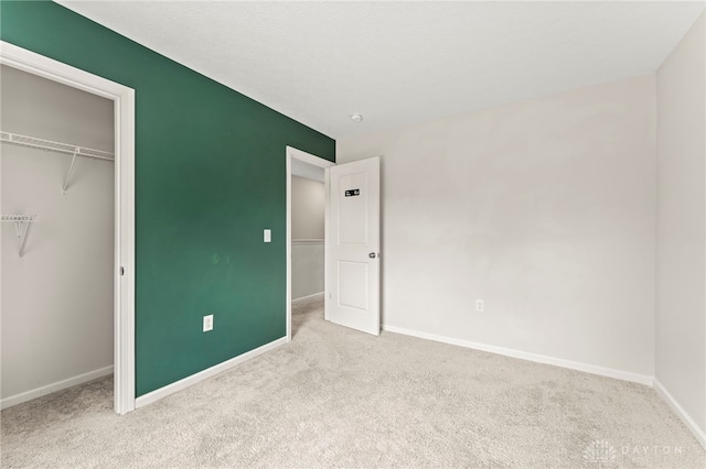 784 Marshall Dr, Xenia, OH 45385 - unfurnished bedroom featuring carpet floors and a closet