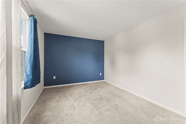 784 Marshall Dr, Xenia, OH 45385 - unfurnished room featuring carpet flooring and baseboards