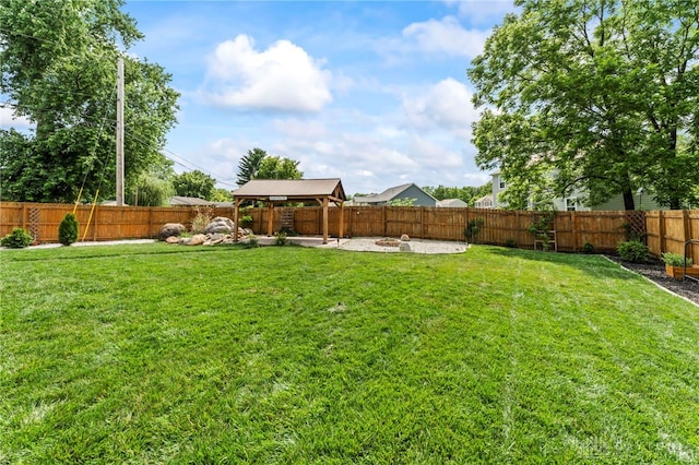 784 Marshall Dr, Xenia, OH 45385 - fenced backyard with a gazebo and a patio area