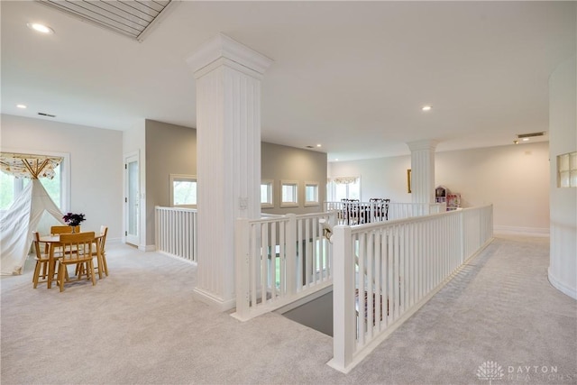 hallway with baseboards, an upstairs landing, recessed lighting, and carpet floors