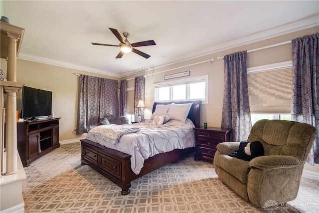 bedroom with ornamental molding, baseboards, and a ceiling fan