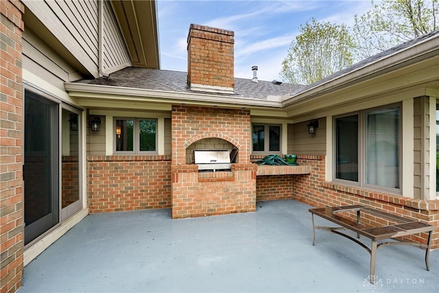view of patio with exterior kitchen
