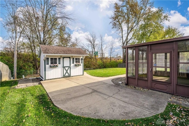1824 Scotch Pine Dr, Beavercreek, OH 45432 - view of patio featuring a shed, fence, and an outbuilding