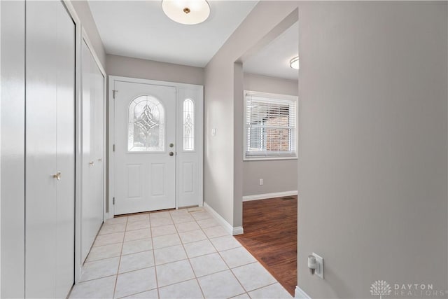 1824 Scotch Pine Dr, Beavercreek, OH 45432 - foyer featuring light tile patterned floors and baseboards