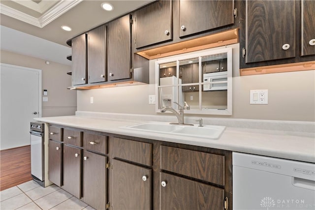 1824 Scotch Pine Dr, Beavercreek, OH 45432 - kitchen with crown molding, light countertops, a sink, and white dishwasher