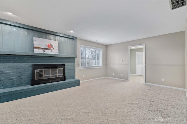 1824 Scotch Pine Dr, Beavercreek, OH 45432 - unfurnished living room with visible vents, recessed lighting, a brick fireplace, carpet floors, and baseboards