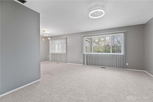 1824 Scotch Pine Dr, Beavercreek, OH 45432 - carpeted spare room featuring baseboards, a wealth of natural light, and visible vents